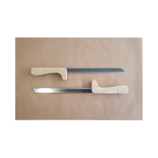 Two swords with beige handles on a brown paper background